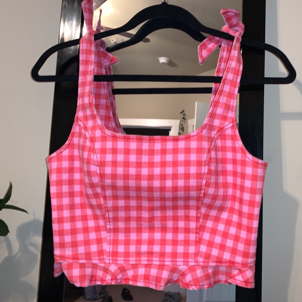 Crop tops and mini skirt.